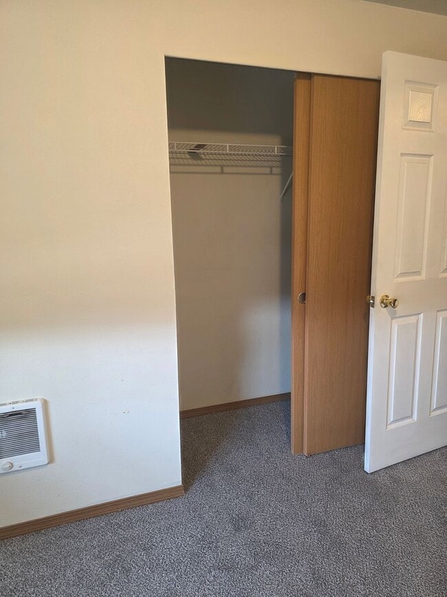 Building Photo - 2 bed 1 bath duplex in the country with park like setting close to town