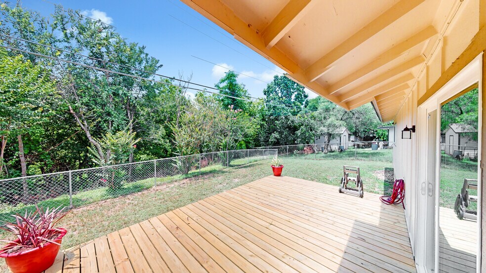 Wooden deck with view of Greenbelt. - 5906 Wagon Bnd