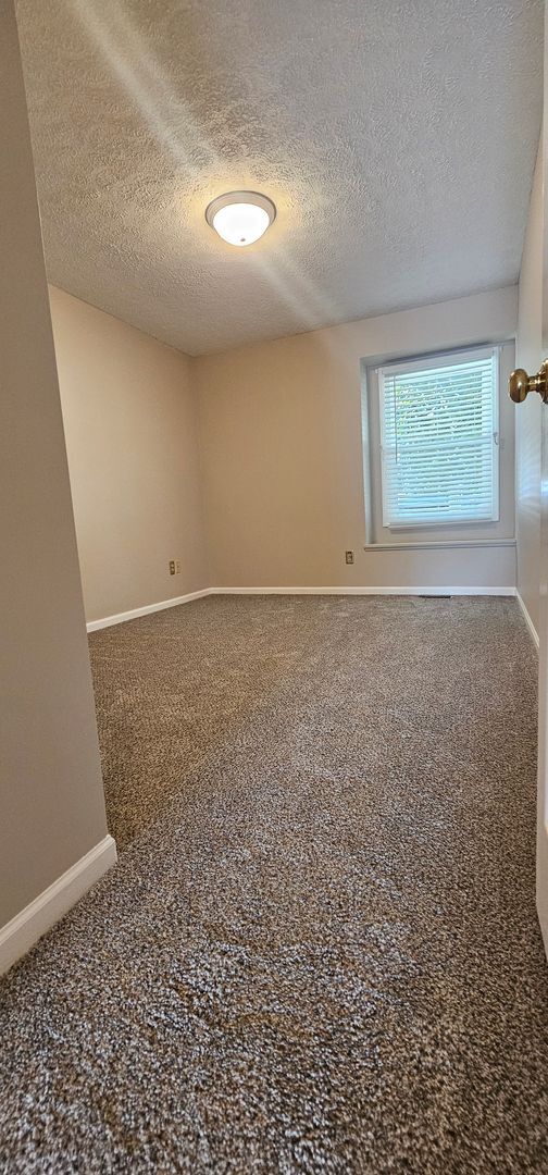 Building Photo - RANCH STYLE 2 BEDROOM CONDO FOR LEASE
