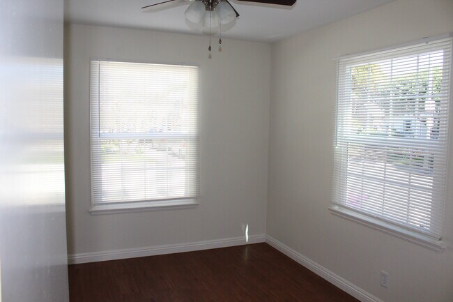 Bedroom with one window facing Prospect and one facing the alley - 4435 E Ocean Blvd