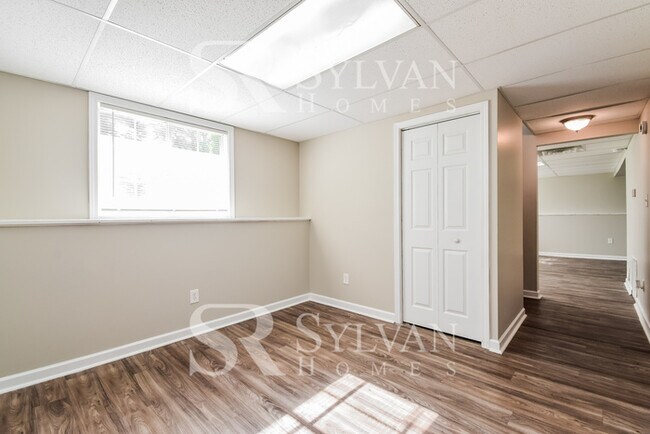 Building Photo - The living is easy in this 4 bedroom, 2 ba...