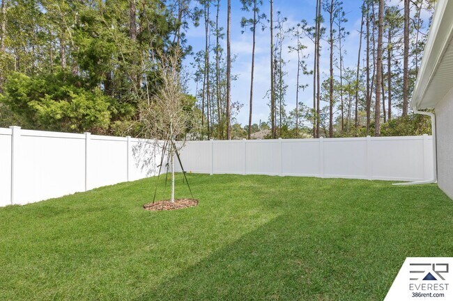 Building Photo - FULLY FENCED, LIKE- NEW 3/2/1 TOWNHOUSE ON A CUL DE SAC IN BEAUTIFUL SEMINOLE WOODS