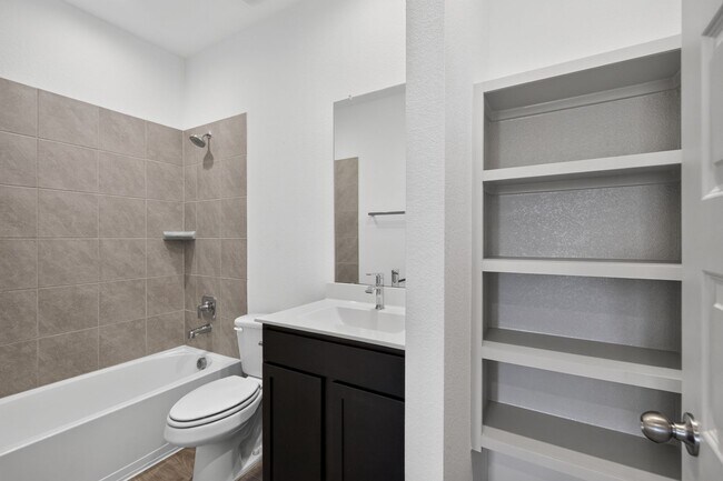 Building Photo - Like-New 4-Bedroom Corner Lot Home with Game Room, Appliances Included & Private Backyard