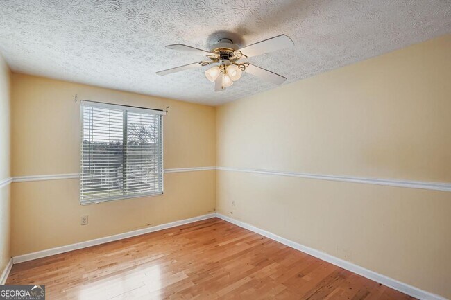 Building Photo - 6134 Raintree Bend