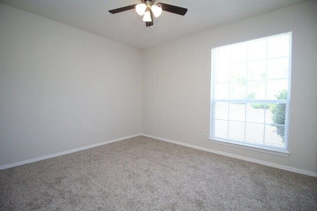 Building Photo - Southwest Pensacola Living at Its Best — 3BR Patio Home in Bay Pine Villas with Open Concept Feel...