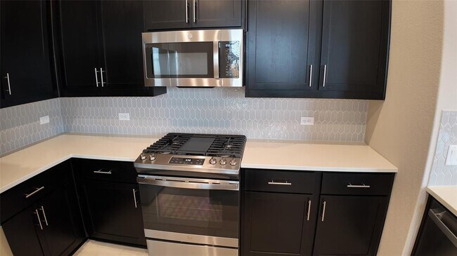 Building Photo - 4806 Warm Wassail Dr