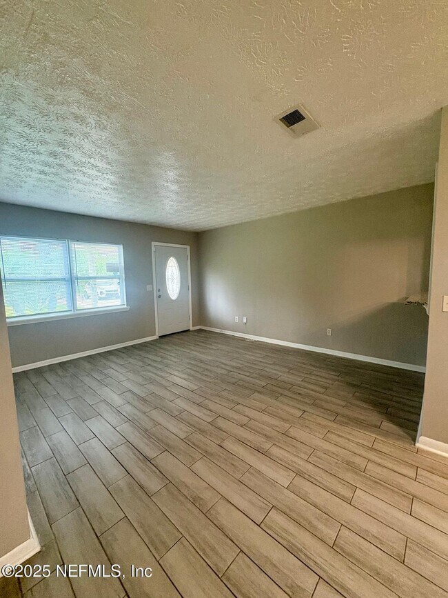Building Photo - 4645 Praver Dr N