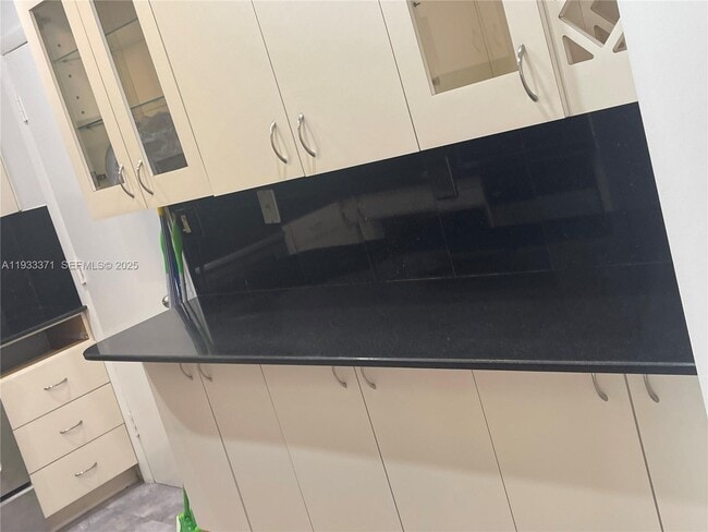 Building Photo - 5005 Collins Ave