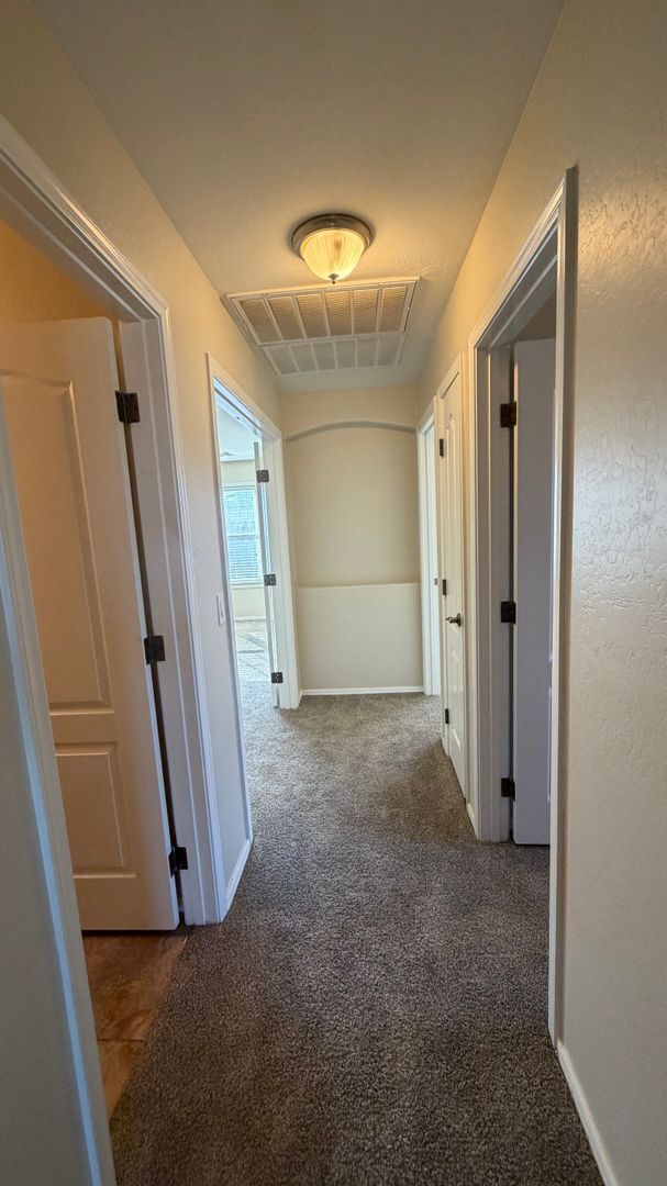 Building Photo - Spacious Surprise home with large backyard