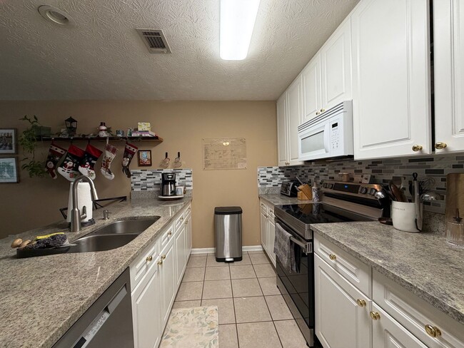 Building Photo - Asbury Hills Condominiums-2428 E. University,  Unit 807