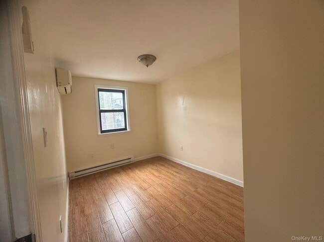 Building Photo - 18-19-19 College Point Blvd