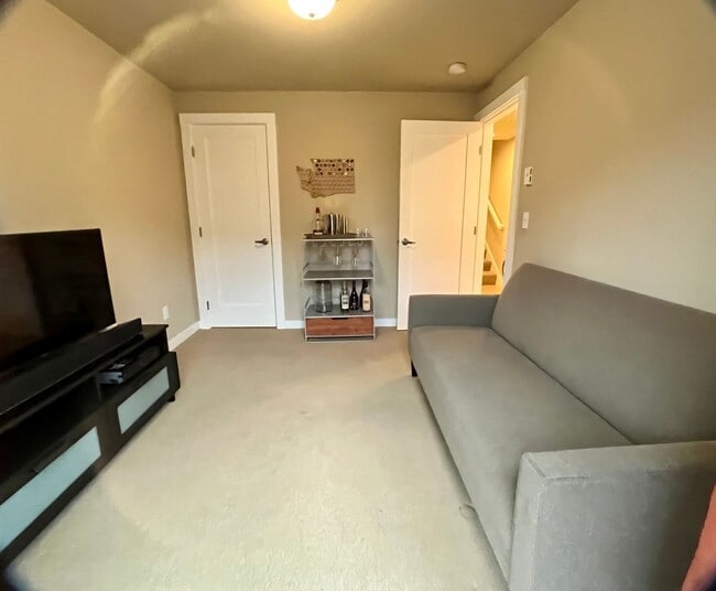 Building Photo - Stylish Greenwood Townhome with Private Patio & Modern Finishes