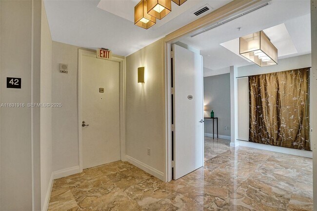 Building Photo - 18101 Collins Ave