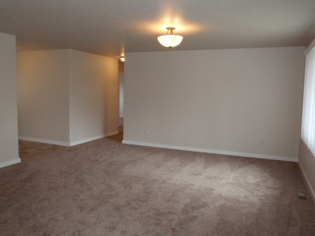 Building Photo - Newer house with attached garage. Half mon...