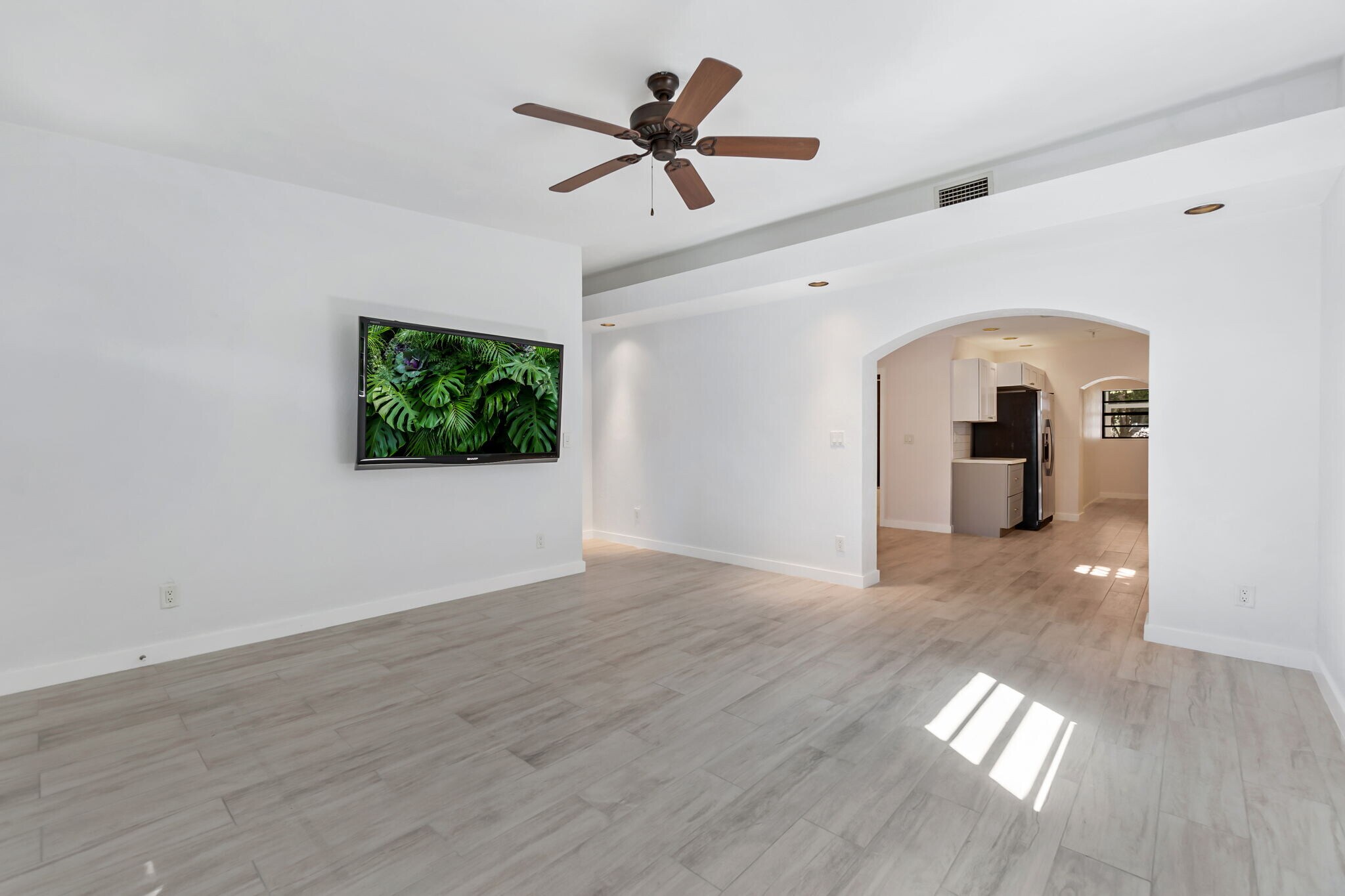 front room flows into kitchen, guest bedroom off to the left hand side - 3275 Cottage Grove Ave