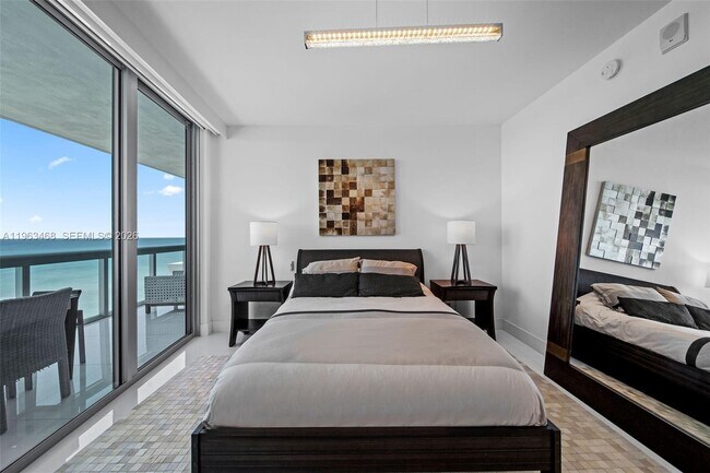 Building Photo - 6899 Collins Ave