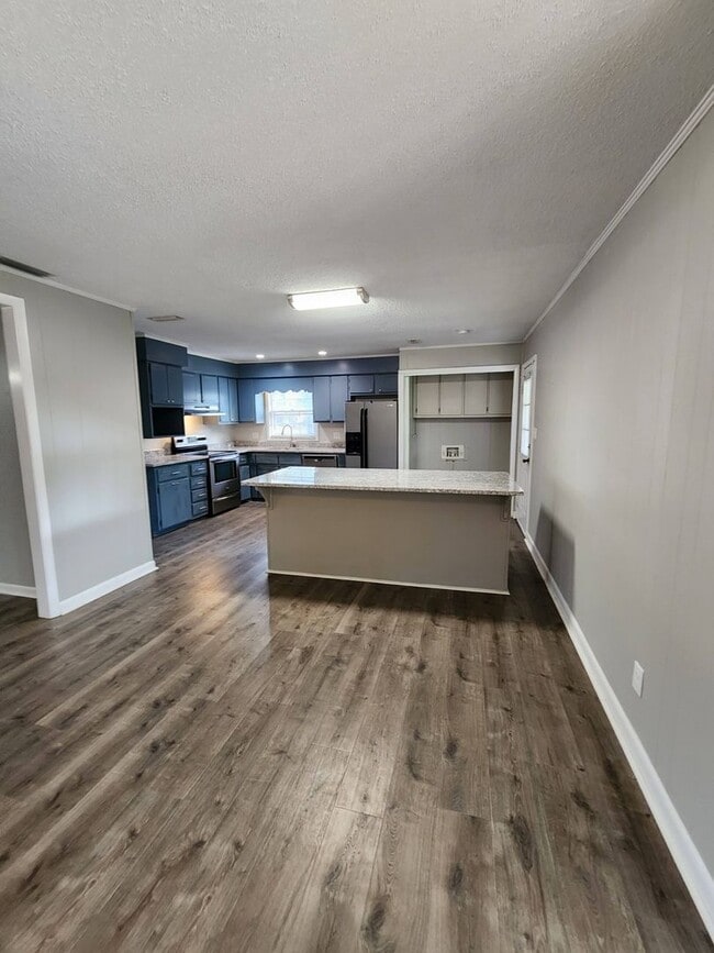 Building Photo - Spacious Brick Home with Modern Upgrades &...