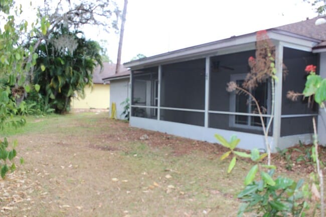 Building Photo - 4 Bedroom/2 Bath/2 Car Garage