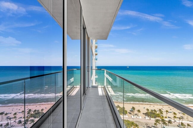 Building Photo - Stunning High-Rise Condo with Ocean Views | Prime Beach Location