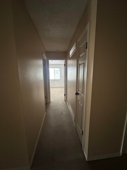 Entrance to 2nd bedroom and bathroom - 1233 Guelbreth Ln