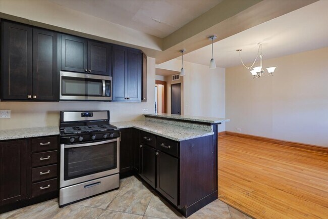Building Photo - 1448 E 72nd Pl