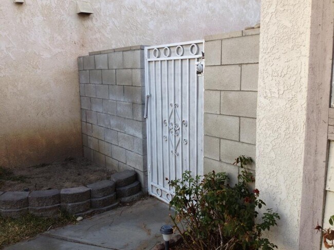 Building Photo - Charming 2-Bed, 2-Bath Pool Home with Fireplace & 2-Car Garage in Quiet Colton Neighborhood