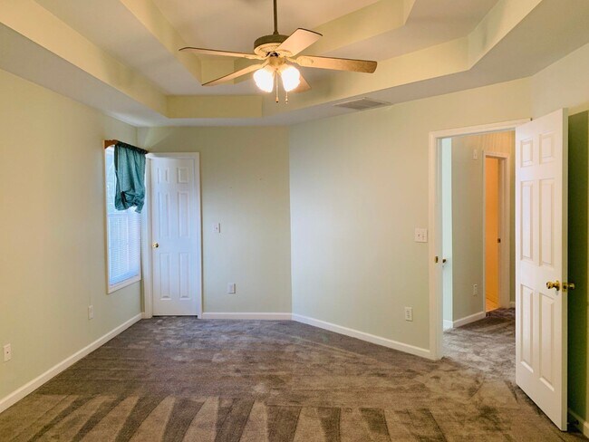 Building Photo - Great location! Lawncare/water is included...