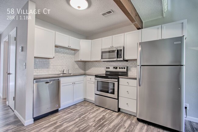 Building Photo - Village Court Two Bedroom with Loft