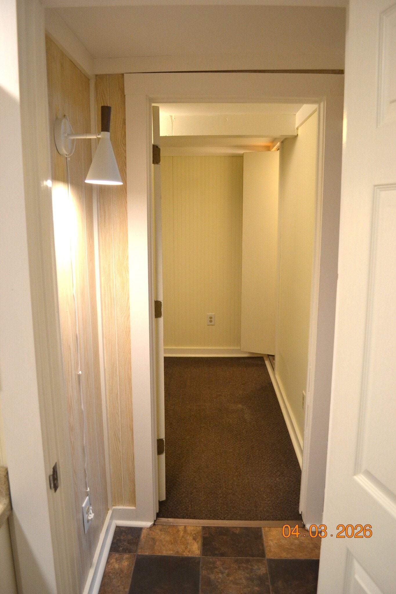 looking across hall from bathroom into bedroom (closet in far right corner) - 222 W Case St