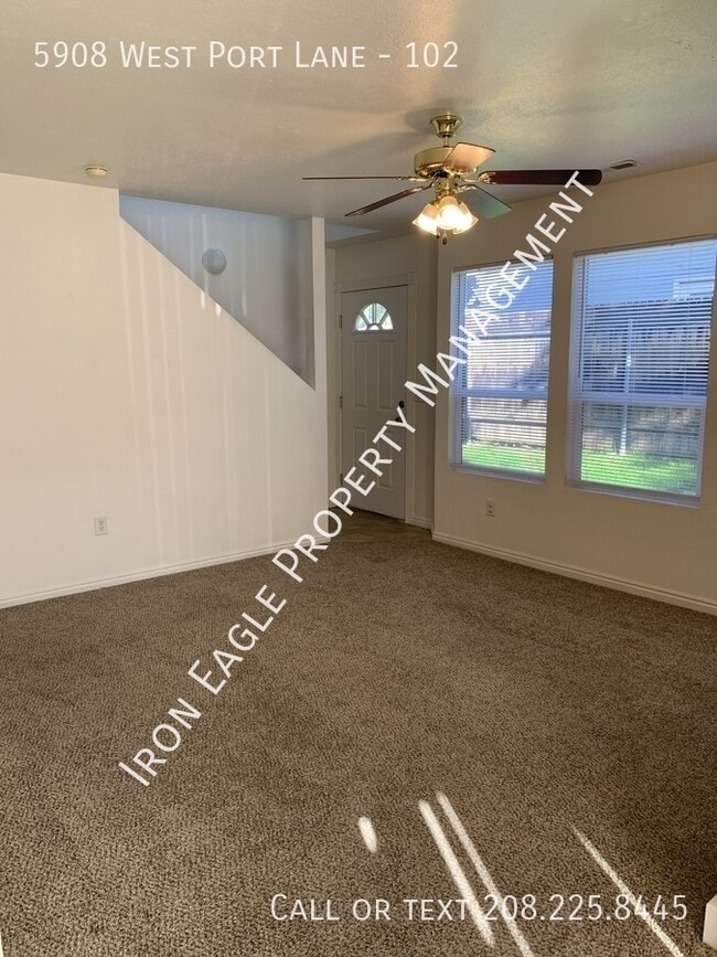 Building Photo - 5908 West Port Lane - 102-