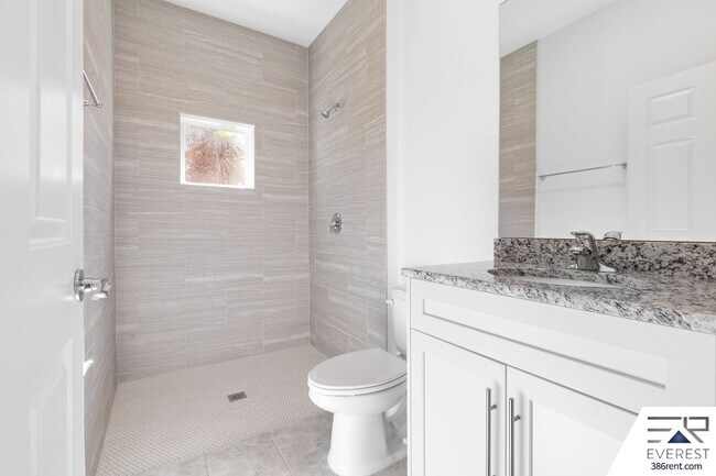 Building Photo - Modern 3-Bed, 2-Bath Townhome with Private Yard & 2-Car Garage