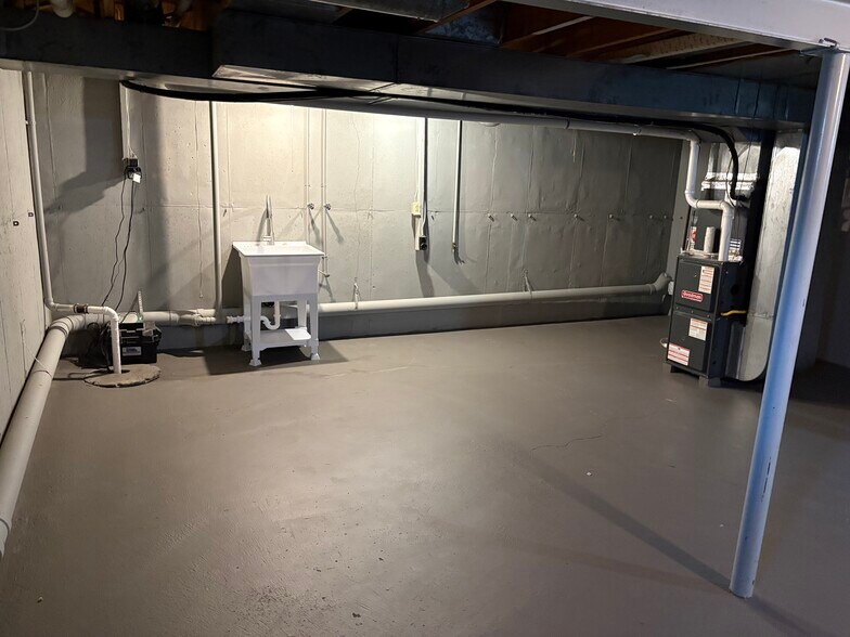 Basement with laundry hookups - 1289 East and West Rd