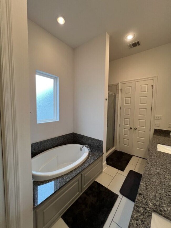 Building Photo - Luxury 4BR Home in Americana | 11 Ft Ceilings, Courtyard Living & Furnished Option at $3,950