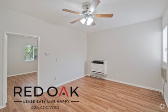 Building Photo - Cheerful One Bedroom with Beautiful Floors...