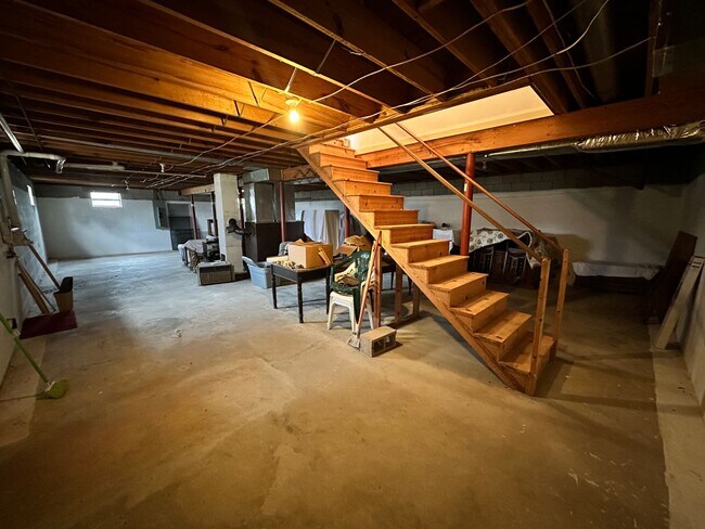 Building Photo - 4-Bedroom Brick Home with Full Unfinished ...