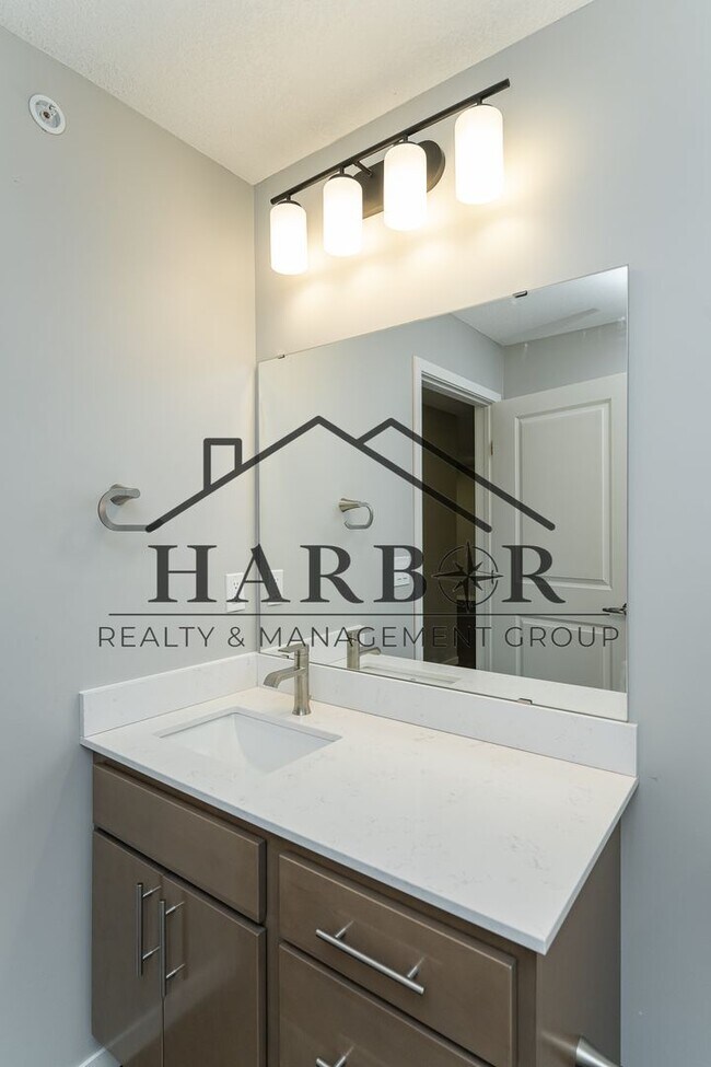 Building Photo - Brand NEW Caroline Apartments 201 -  Move ...