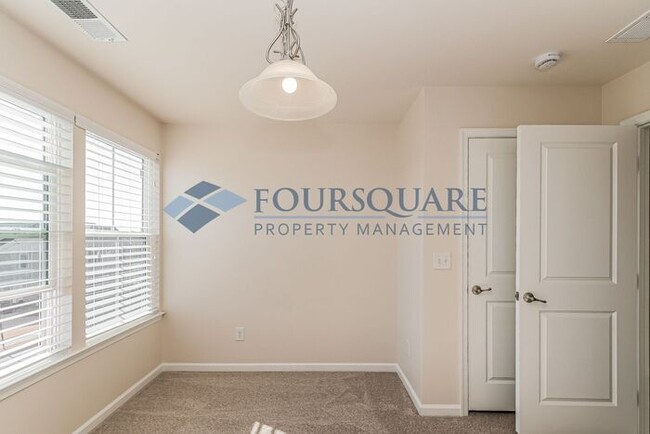 Building Photo - Spacious 3-Bed End Unit Townhome with 2-Car Garage & Private Patio | Prime Kitts Creek Location