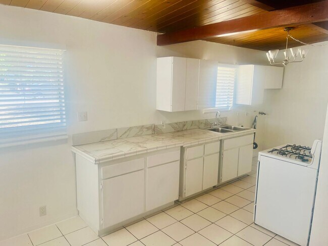 Building Photo - Charming 3-Bedroom Home including 250sqft ...