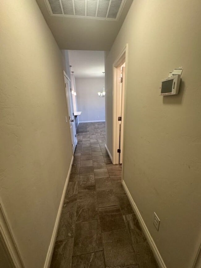 Building Photo - Storm shelter, All Appliances and security system with monitoring! 4 bed, 2 bath 2 car garage!