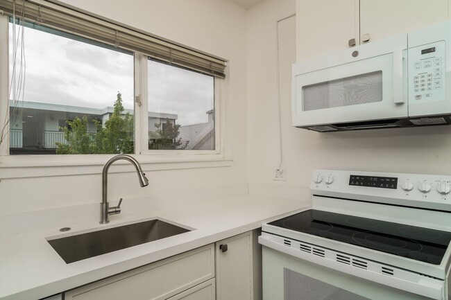 Building Photo - Modern Comfort Meets Classic Charm in This...