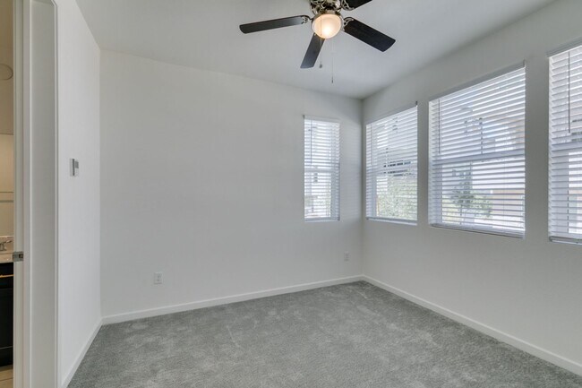 Building Photo - Stunning 4-Level Townhome in Inspirada | R...