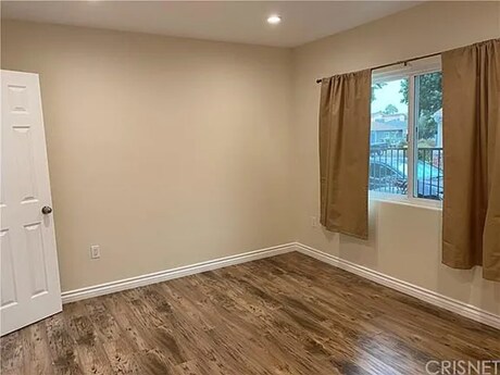 Building Photo - 6657 Enfield Ave