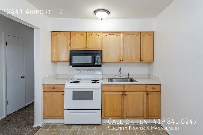 Building Photo - 2441 Airport-2