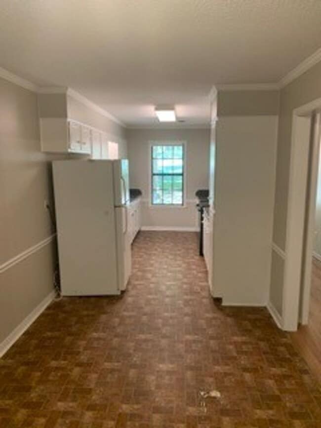 Building Photo - Britton Dr. - 4 Bedroom / 2 Bath House with Large Yard!!