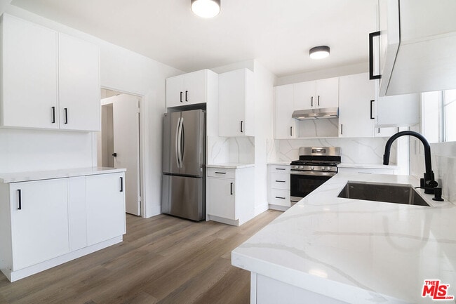 Building Photo - 6686 Drexel Ave