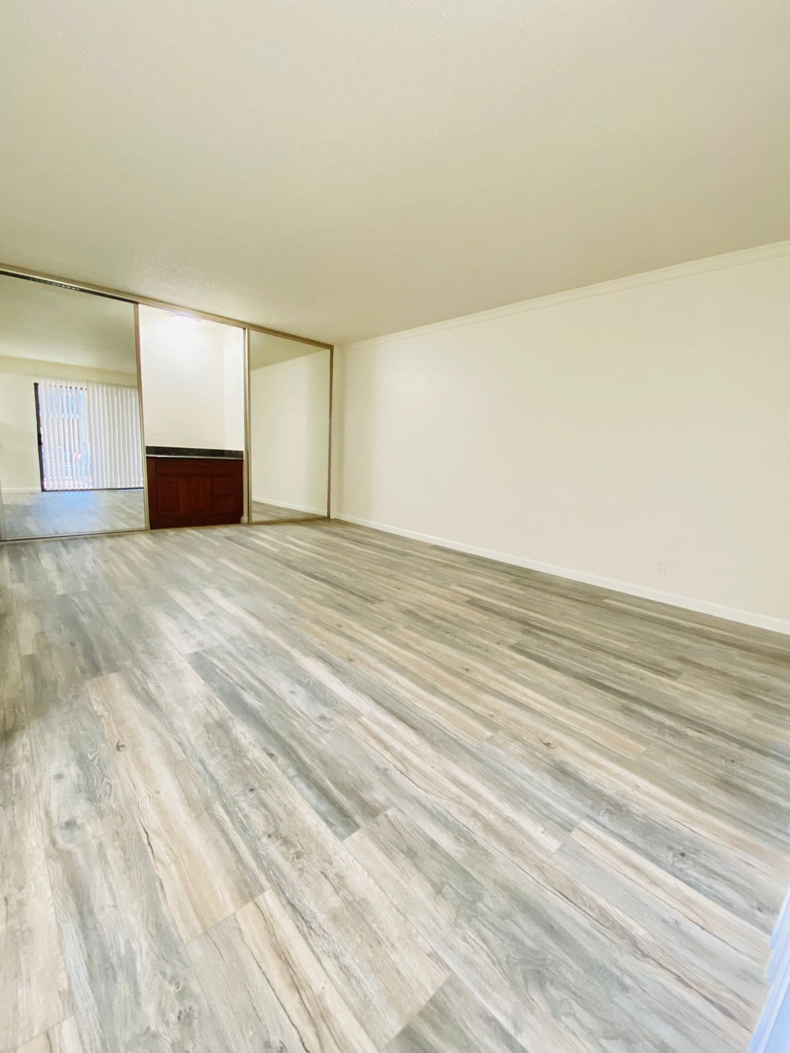 Living with mini bar and storage - 350 N Civic Dr