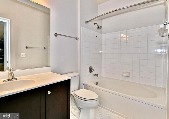 Building Photo - This impeccable 2-bedroom, 2-full bathroom condo is located in the sought-after, super-convenient...