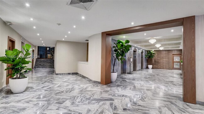 Building Photo - 5401 Collins Ave