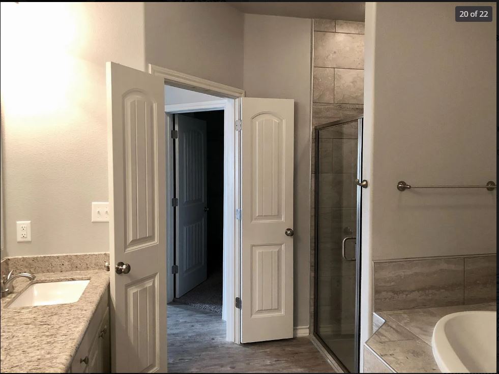 master bathroom/looking into closet - 5203 Marshall St