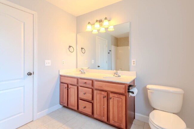 Building Photo - 3 bed, 2.5 bath brick home across from Ted Rhodes Golf Course